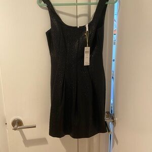 Bcbg mini dress with shiny textured fabric. Size 6 never worn with tags on